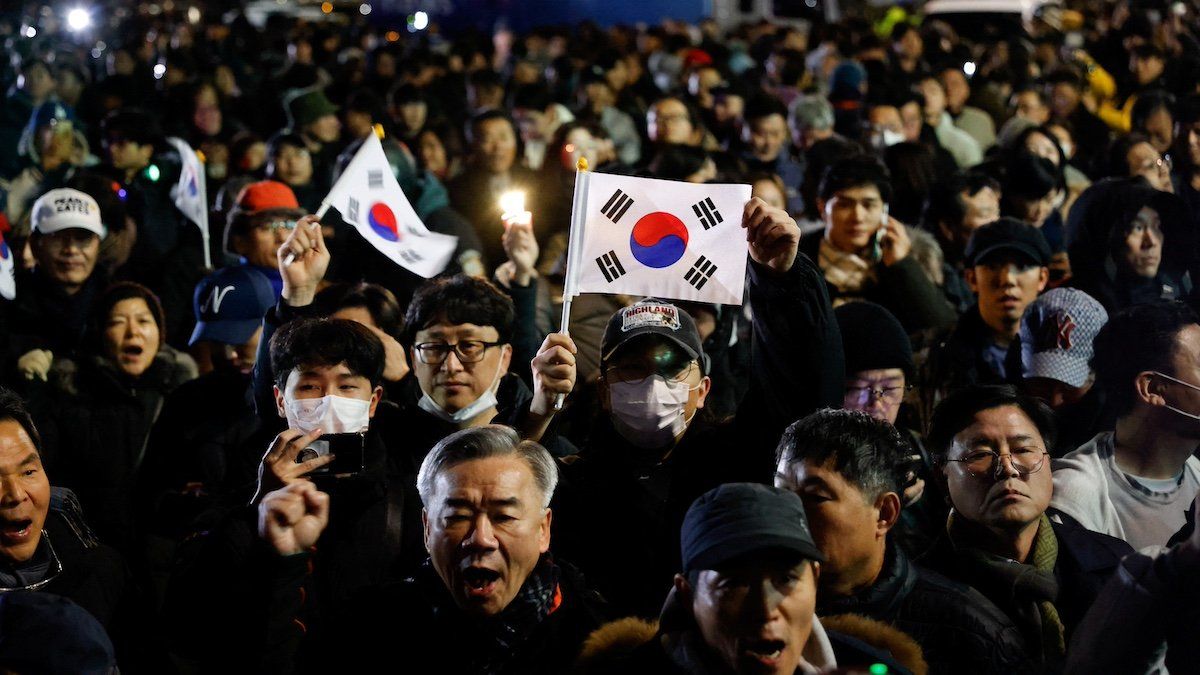 People gather outside the National Assembly after South Korean President Yoon Suk Yeol declared martial law, in Seoul, South Korea, on Dec. 4, 2024.