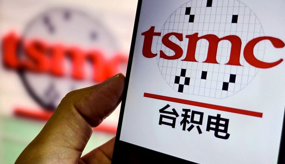 ​Photo illustration of TSMC logos.