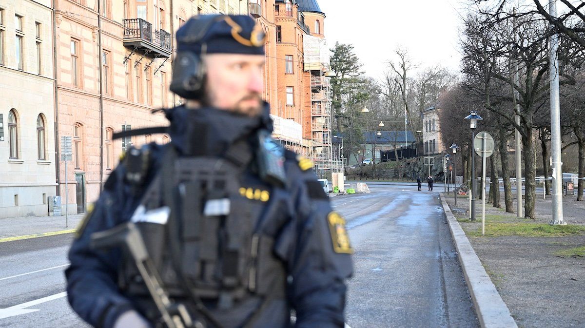 Police officers stand near the Israeli embassy, on the day an object believed to be an explosive device was found and destroyed by the national bomb squad according to police, in Stockholm, Sweden January 31, 2024.