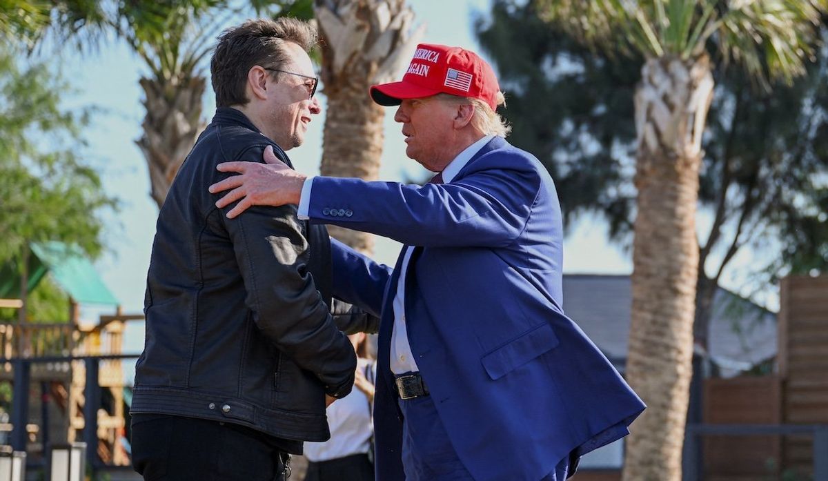 ​President-elect Donald Trump greets Elon Musk before attending a viewing of the launch of the sixth test flight of the SpaceX Starship rocket, in Brownsville, Texas, U.S., on Nov. 19, 2024.