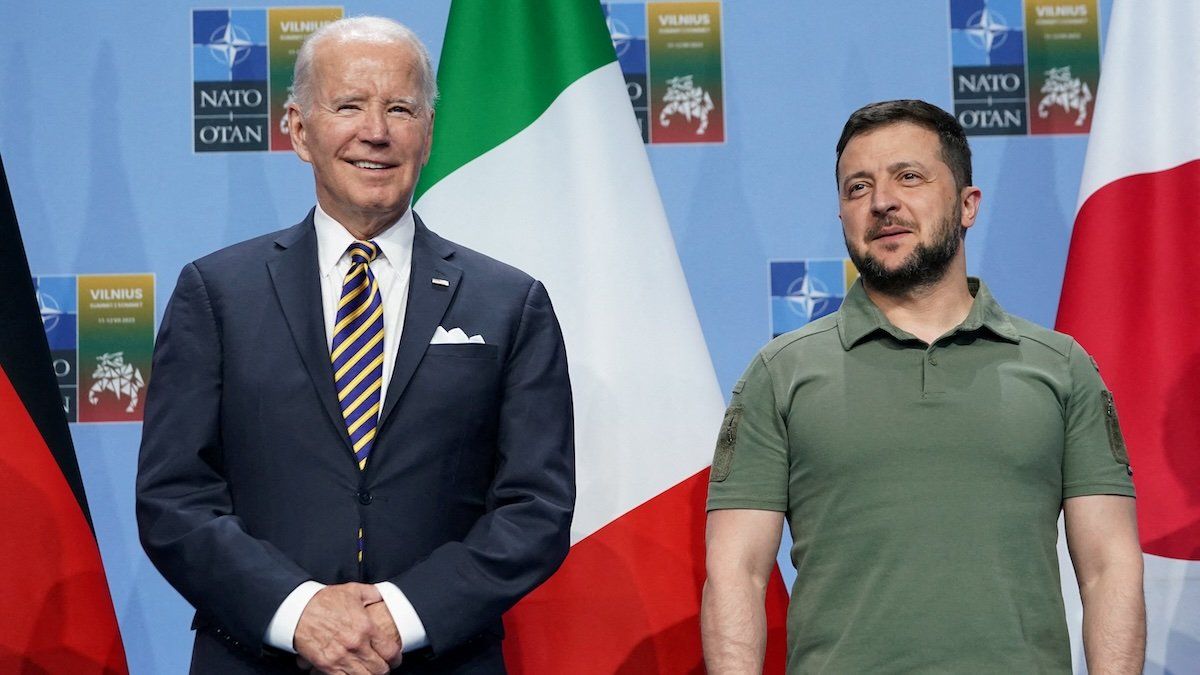 President Joe Biden and Ukraine’s President Volodymyr Zelenskiy pose for a photo, as they attend an event with G7 leaders to announce a joint declaration of support for Ukraine, as the NATO summit is held in Vilnius, Lithuania, July 12, 2023. 
