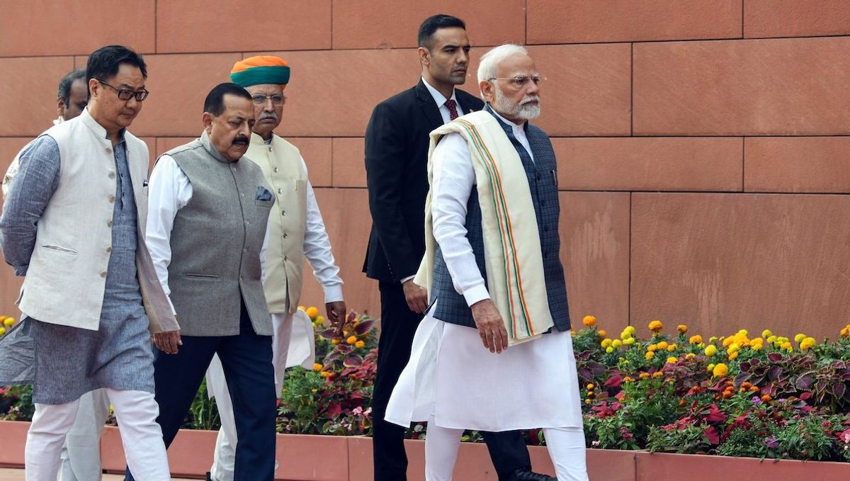 Prime Minister Narendra Modi arrives to address the media ahead of the commencement of the Winter Session of Parliament, in New Delhi, on Monday, Nov. 25. 