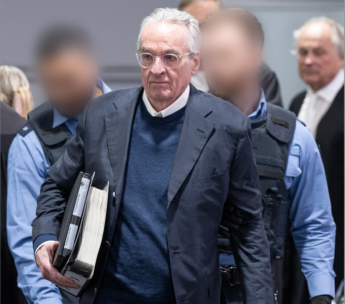 ​Property investor Heinrich XIII Prinz Reuss and his lawyers arrive for his trial for a suspected "Reichsbuerger" plot to overthrow Germany's democracy in a courtroom in Frankfurt, Germany, May 21, 2024. 