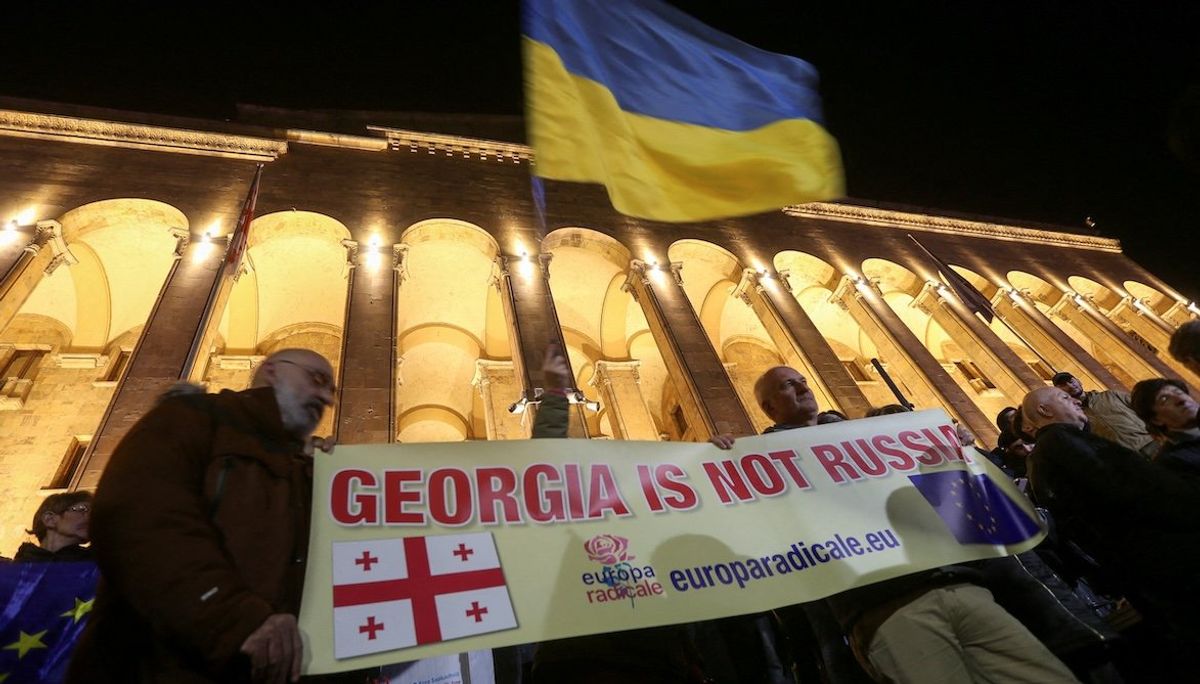 ​Protesters, including supporters of Georgia's opposition parties, hold a rally to dispute the Georgian Dream's declared victory in the weekend's parliamentary election in Tbilisi, Georgia, on Oct. 28, 2024.