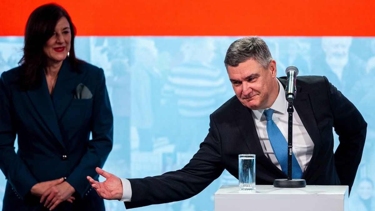 ​Re-elected Croatian President Zoran Milanovic with wife Sanja Music Milanovic celebrate after winning Croatia's presidential election ON January 12, 2025 in Zagreb, Croatia. 