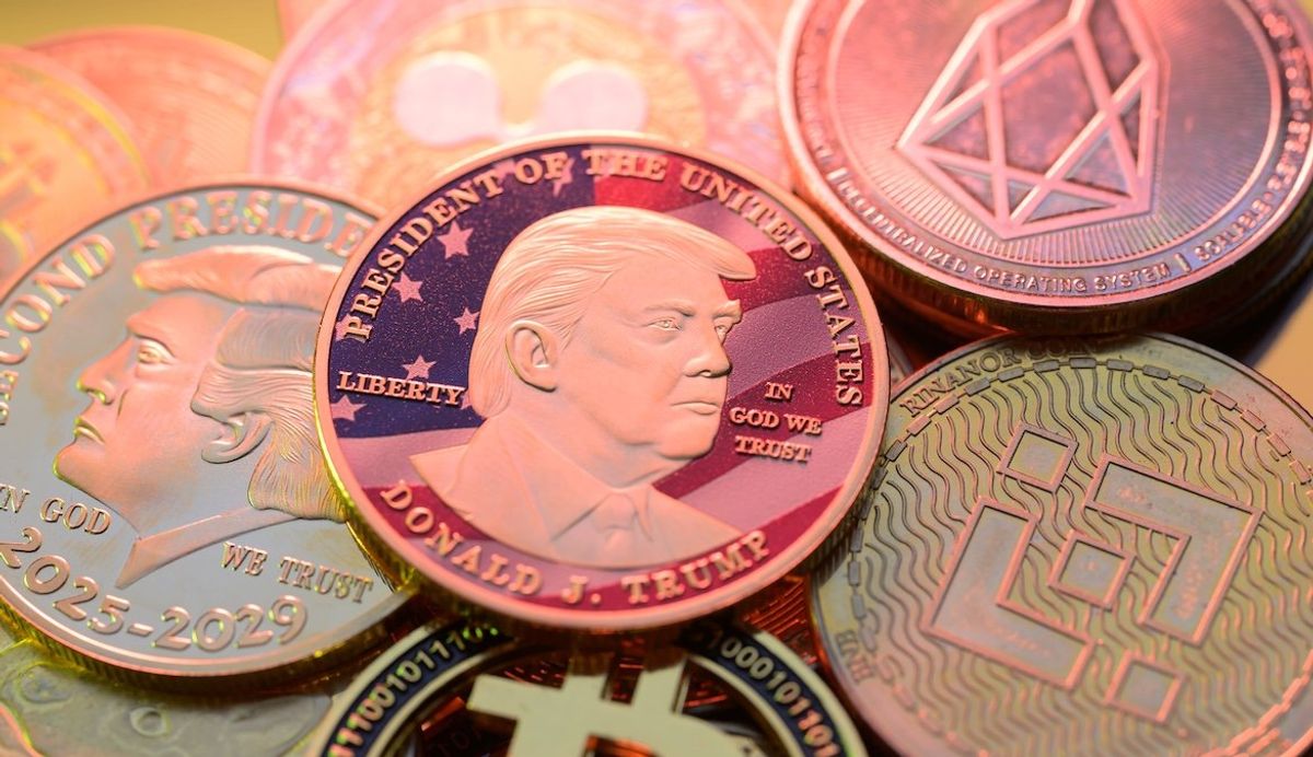 ​Representation of the $Trump meme coin together with Bitcoin and crypto coins, seen in this photo illustration. 