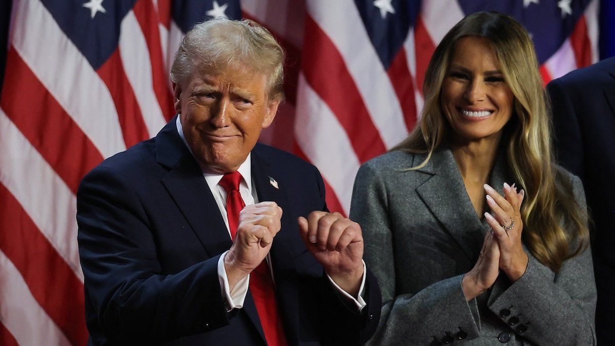 Republican presidential nominee and former U.S. President Donald Trump dances accompanied by Melania Trump, after speaking following early results from the 2024 U.S. presidential election in Palm Beach County Convention Center, in West Palm Beach, Florida, U.S., November 6, 2024.