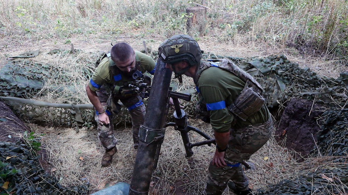 ​Servicemen of the 24th King Daniel of Galicia Separate Mechanized Brigade are firing a mortar at the positions of Russian troops near Chasiv Yar in Donetsk region, Ukraine, on August 14, 2024.