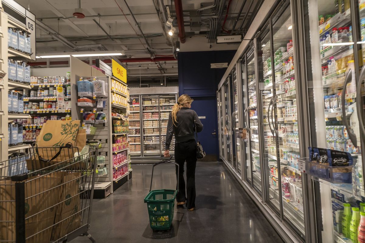 ​Shopping in a Whole Foods Market supermarket in New York on Monday, August 12, 2024. 