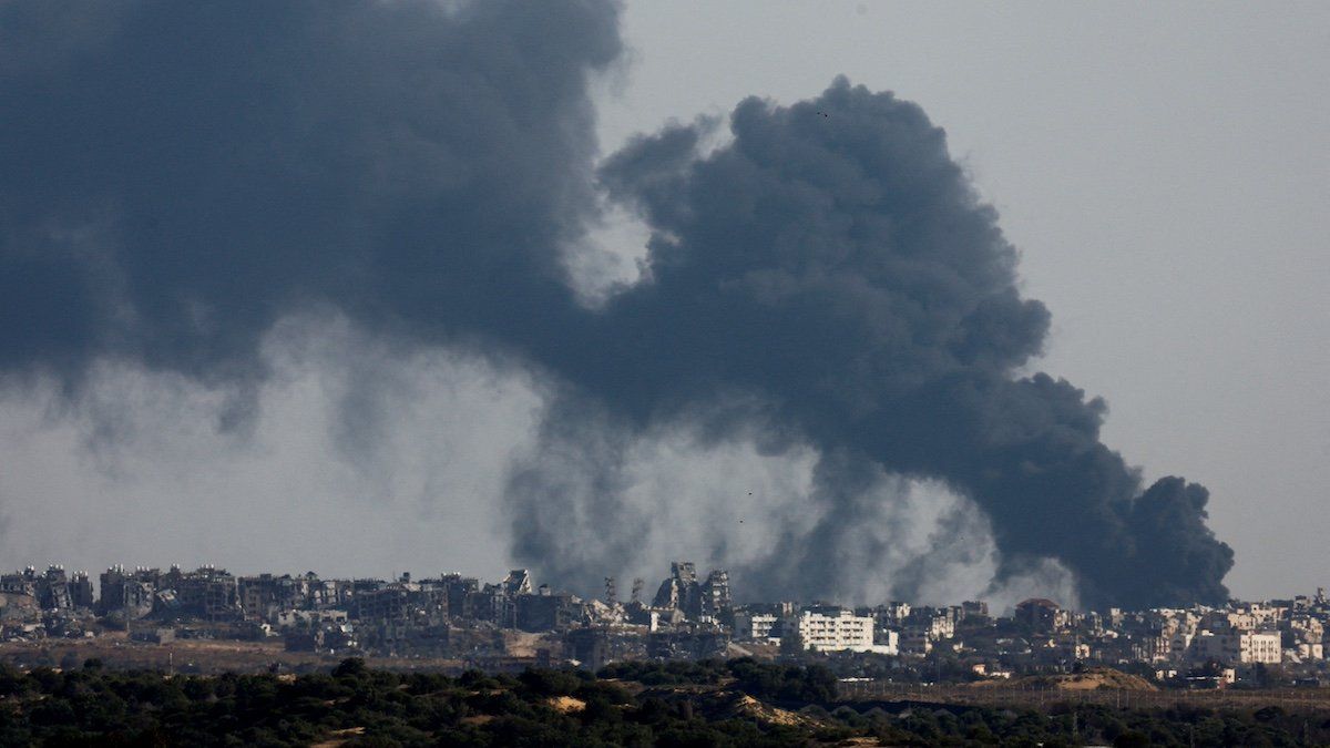 ​Smoke billows after an explosion in northern Gaza, amid the ongoing conflict between Israel and the Palestinian Islamist group Hamas, as seen from Israel, May 12, 2024. 