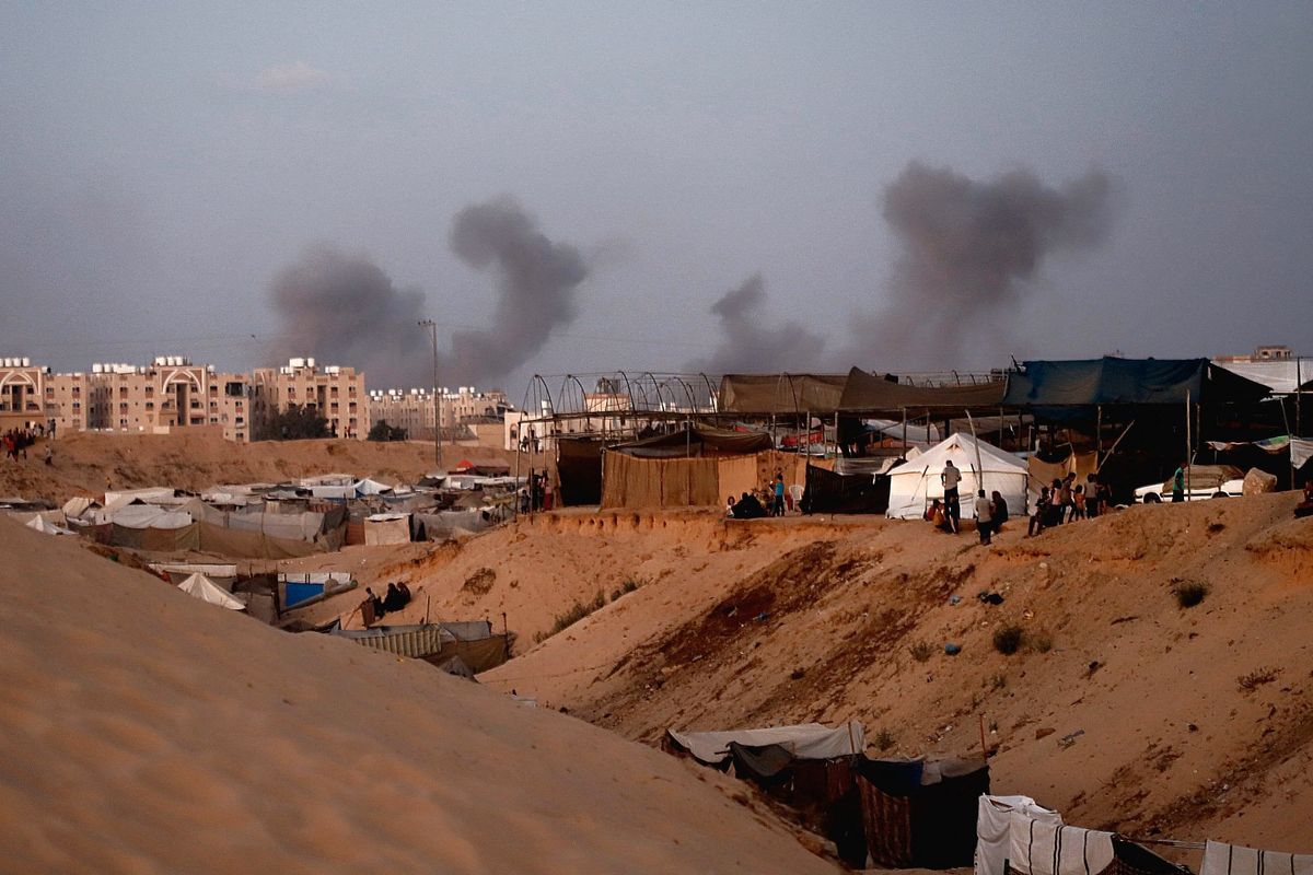 Smoke rises from the vicinity of the Hamad Towers area, west of Khan Younis, Gaza trip, August 14, 2024.