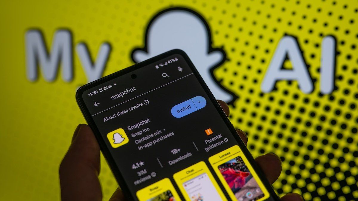 SnapChat app displayed on a smart phone with in the background SnapChat My AI, seen in this photo illustration, on August 20, 2023, in Brussels, Belgium. 