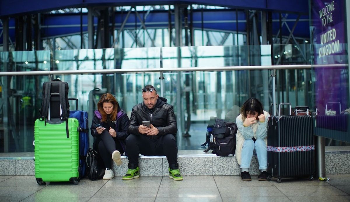 Stranded passengers at Heathrow Terminal 5 in London on Friday, March 21, 2025. 