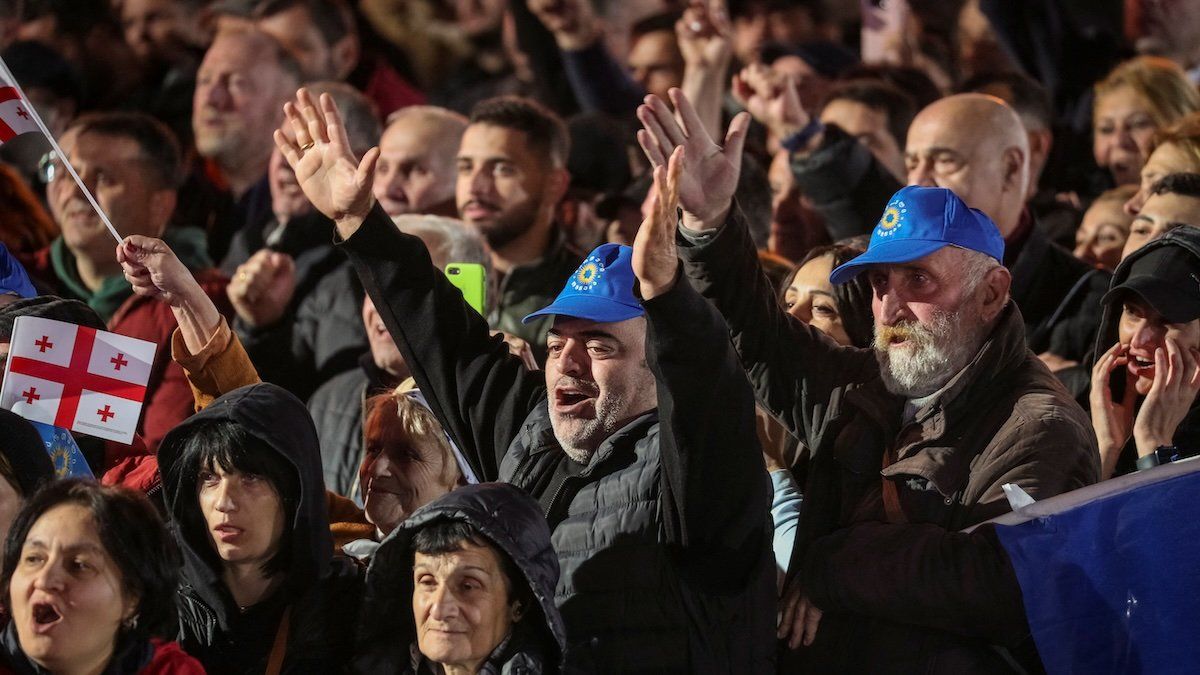 Supporters of the Georgian Dream party attend a final campaign rally ahead of the upcoming parliamentary elections in Tbilisi, Georgia October 23, 2024. 