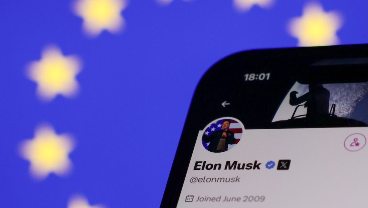 ​The European Union flag is displayed on a laptop screen and Elon Musk's account on X is displayed on a phone screen.