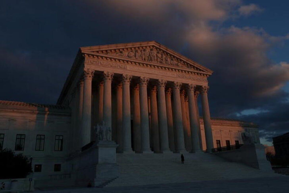 The sun sets at the U.S. Supreme Court building the week that the court is expected to hear arguments in a Mississippi case that challenges Roe v. Wade in Washington, U.S., November 29, 2021. 
