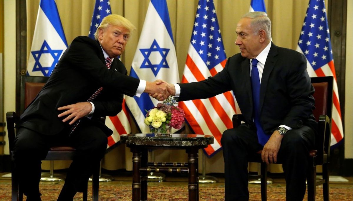 ​U.S. President Donald Trump and Israel's Prime Minister Benjamin Netanyahu shake hands after speaking to reporters before their meeting at the King David Hotel in Jerusalem on May 22, 2017. 