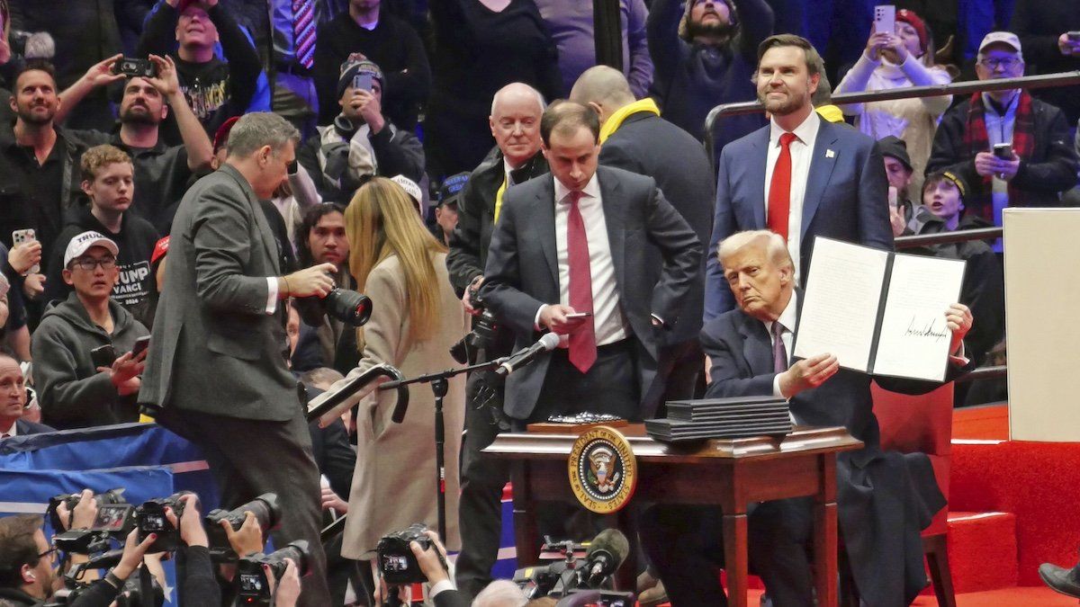 ​U.S. President Donald Trump shows a signed executive order to his supporters in Washington on Jan. 20, 2025, following his inauguration. 