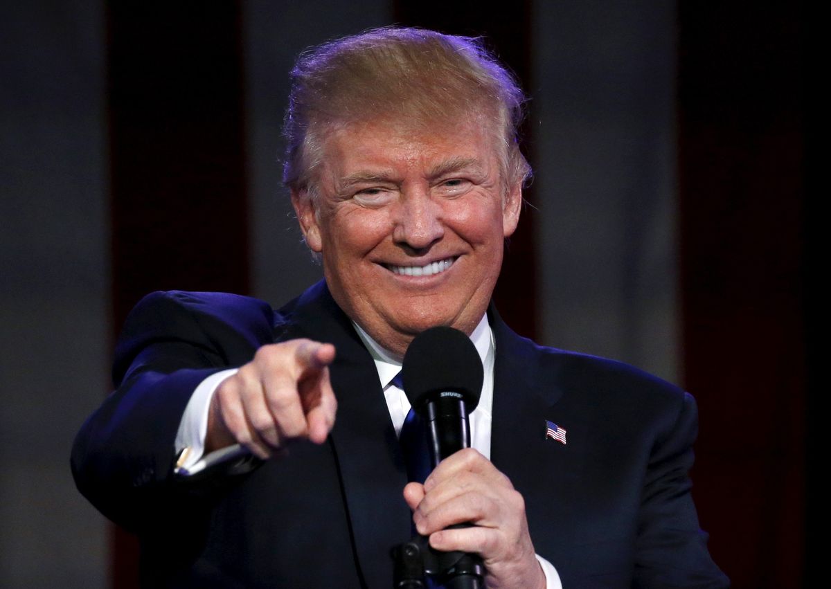 U.S. Republican presidential candidate Donald Trump smiles during the Suffolk County Republican Committee fundraising reception in Patchogue, New York April 14, 2016. 