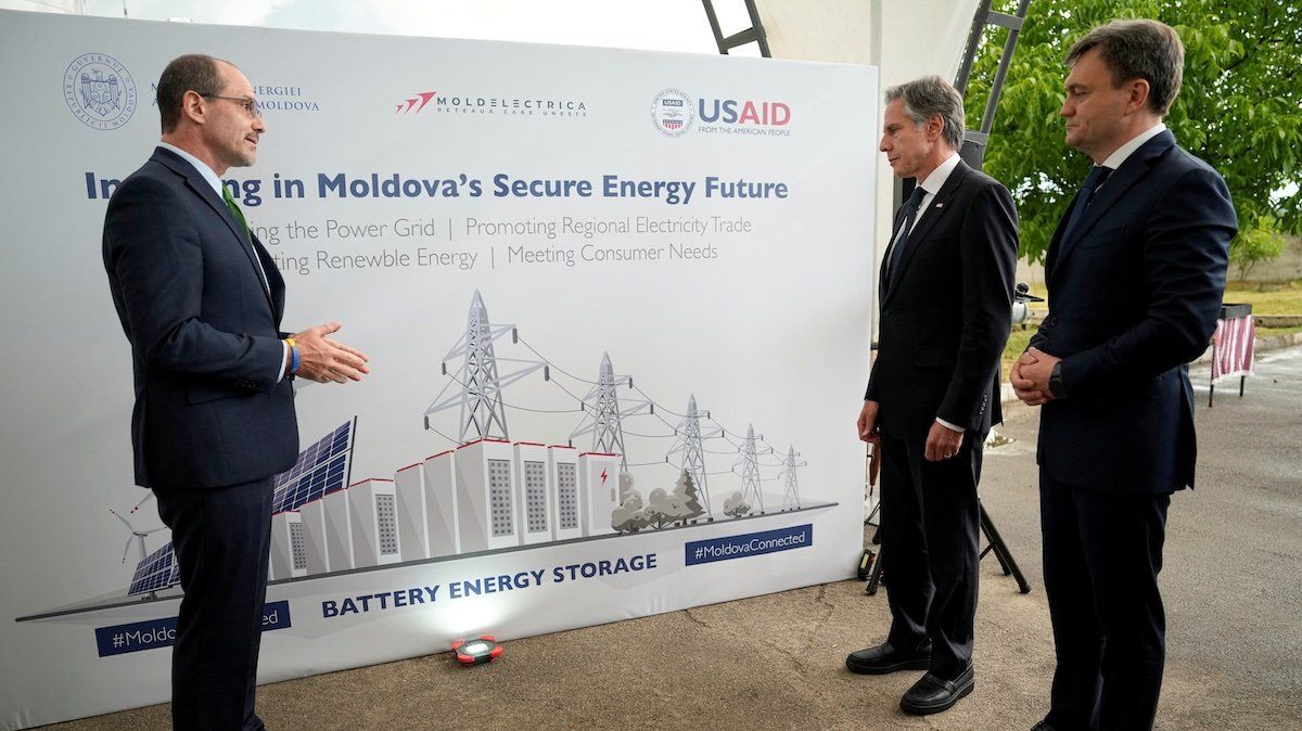 ​U.S. Secretary of State Antony Blinken and Moldova's Prime Minister Dorin Recean, listen to USAID Moldova Mission Director Jeff Bryan, during a visit to the site of Moldelectrica Chisinau Substation in Braila south of the capital of Moldova, May 29, 2024.