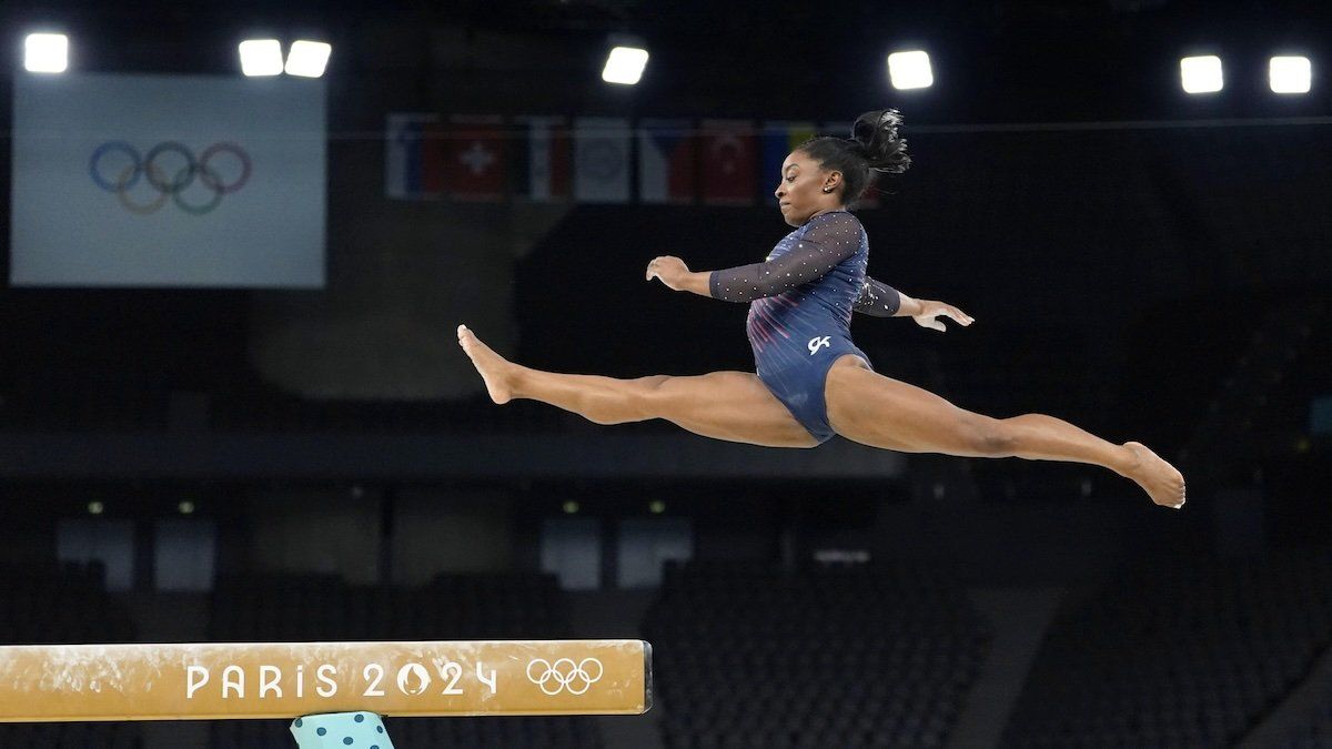 US artistic gymnast Simone Biles practices during an official training session at Bercy Arena in Paris on July 25, 2024, ahead of the Paris Olympics.