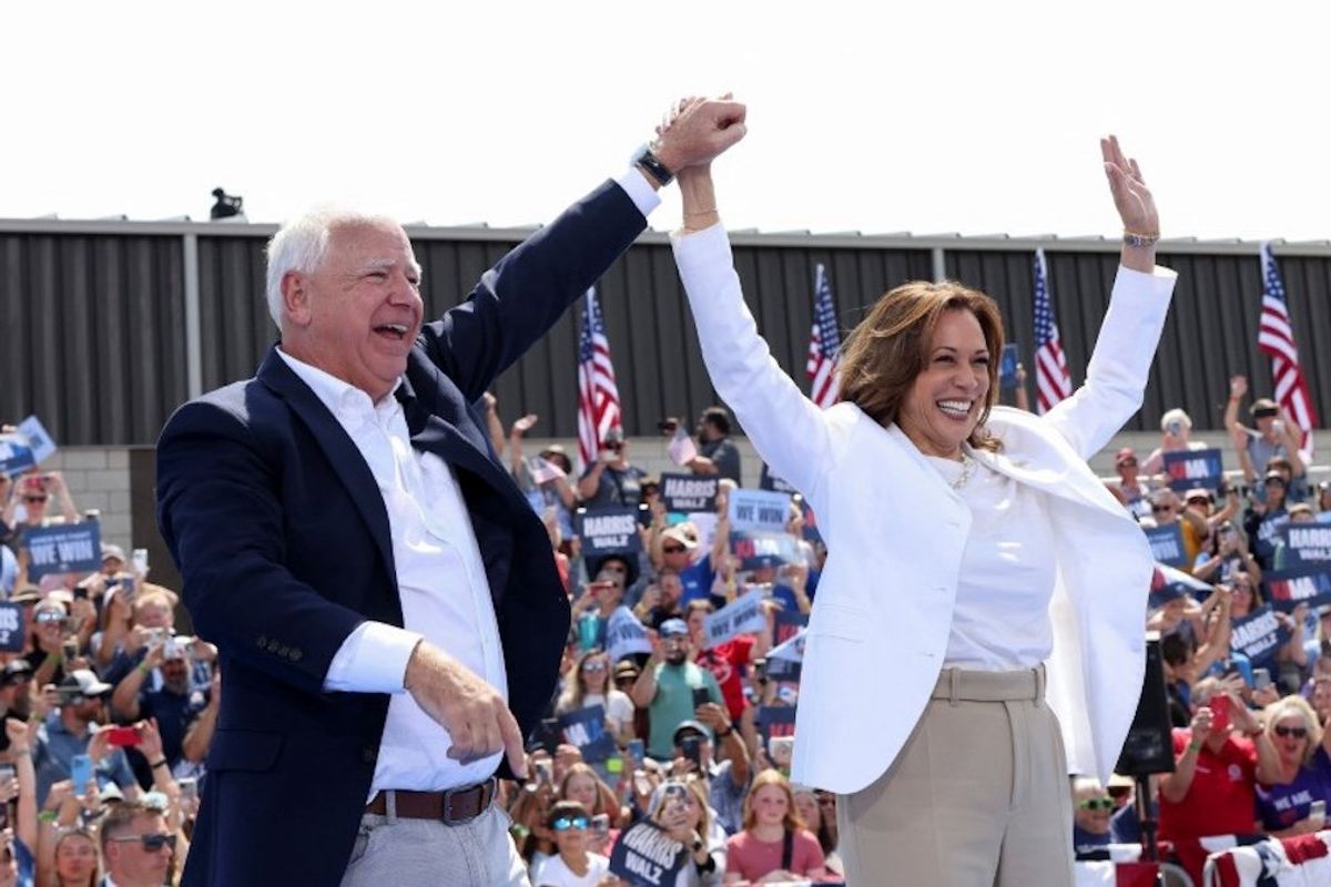 ​US Vice President and Democratic presidential candidate Kamala Harris and her running mate Minnesota Gov. Tim Walz hold a campaign event in Eau Claire, Wisconsin, on Aug. 7, 2024. 