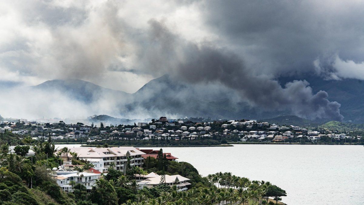 Violent riots have been taking place in Noumea since yesterday evening. Numerous shops and a number of houses have been set alight, looted or destroyed by young independantists, who reject the reform of the electoral freeze. In photo: view of Noumea, where many buildings are under fire. New Caledonia, Noumea, May 14, 2024.